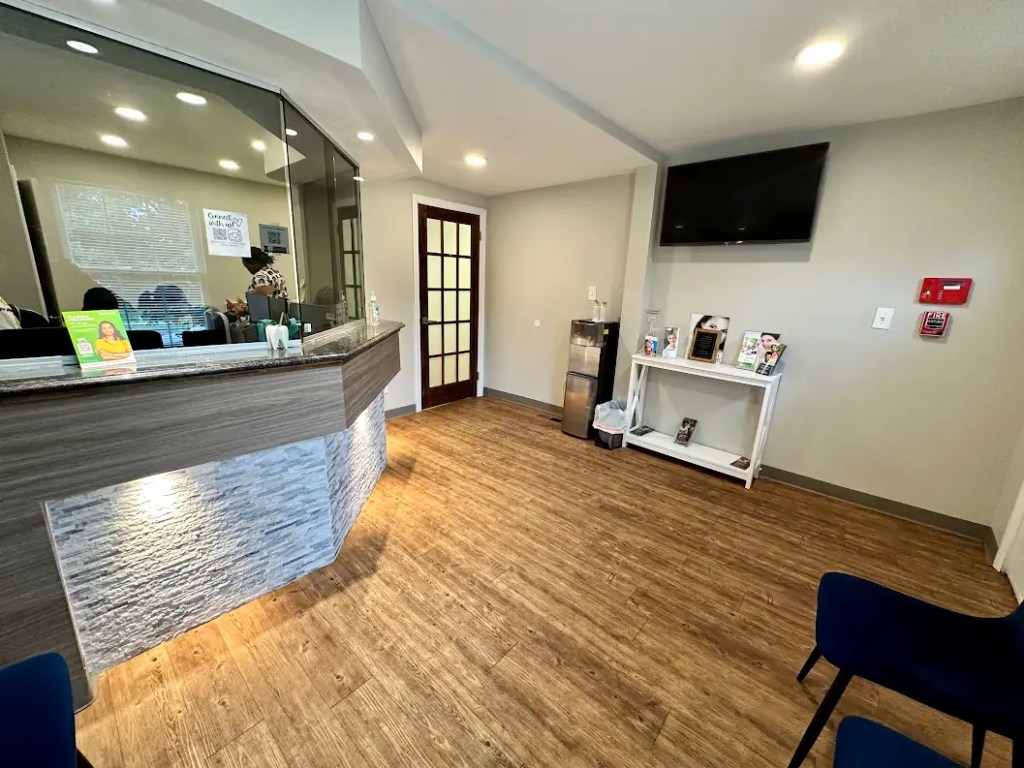 Inside seating area and front desk alternate view