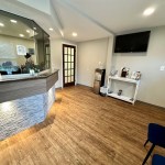 Inside seating area and front desk alternate view